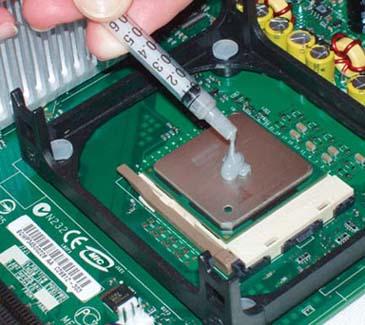 Apply the provided thermal compound