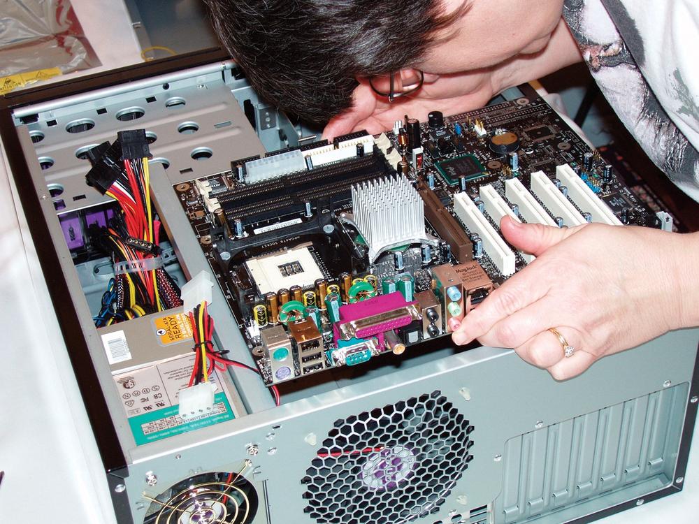 Verify that a standoff is installed for each motherboard mounting hole and that no extra standoffs are installed