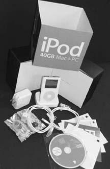 After the outer sleeve (top) is removed, the artfully designed packaging opens up to reveal the inner iPod. The 2004 iPods and the iPod Minis include both FireWire and USB 2.0 cables, and Hewlett-Packard’s edition of the iPod comes with its own set-up poster and Windows-only instructions. The iPod comes with all the hardware and software you need to get up and running, but the choice of music to put on it is up to you. Apple began to streamline the iPod box contents in 2005, so if your iPod didn’t come with all the accessories shown here, you can find them for sale at .