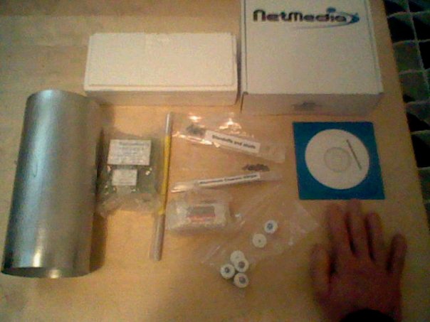 Parts arrive in a box, looking not much like a satellite
