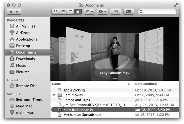 The top half of a Cover Flow window is an interactive, scrolling “record bin” full of your own stuff. It’s especially useful for photos, PDF files, Office documents, and text documents. When a PDF or presentation document comes up here, you can click the arrow buttons to page through it; for a movie, click the little button to play the video, right in place.