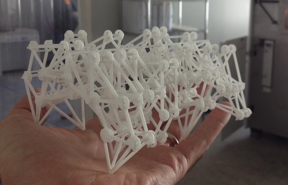 A Strandbeest mechanism by Theo Jansen, printed in nylon on an EOS selective laser sintering (SLS) machine at Shapeways headquarters in New York. Dust it off and it’s ready to walk.