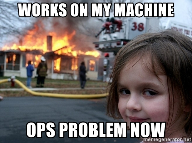 A smiling girl in front of a burning house, with the caption: 'Works on my machine; ops problem now'.